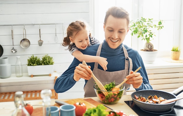 Happy family in the kitchen.