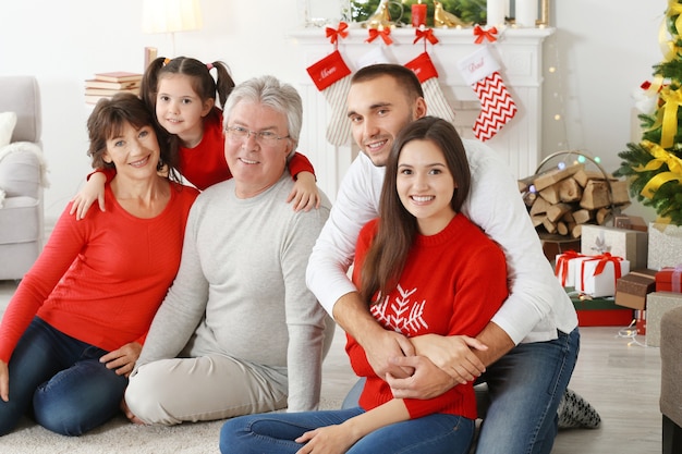 Happy family in living room decorated for Christmas