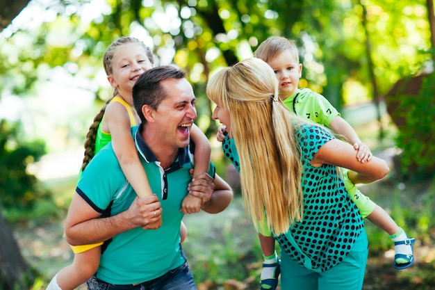 Happy family in the park. Happiness.