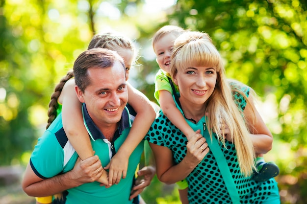 Happy family in the park. Happiness.