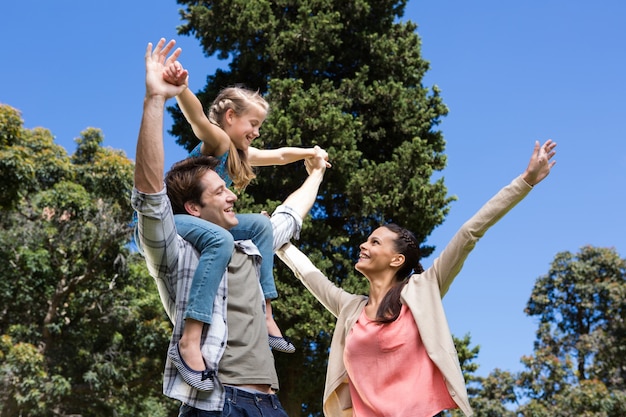 Happy family in the park together