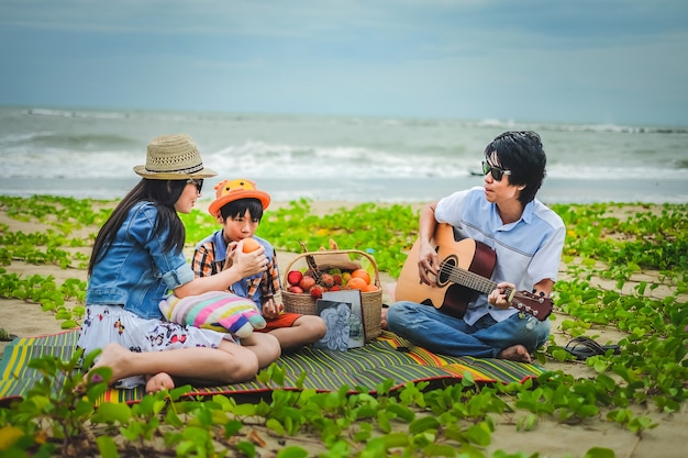 happy family picnic on the beach. 