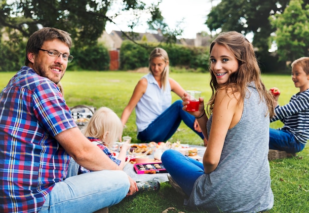 Happy family picnic in the park