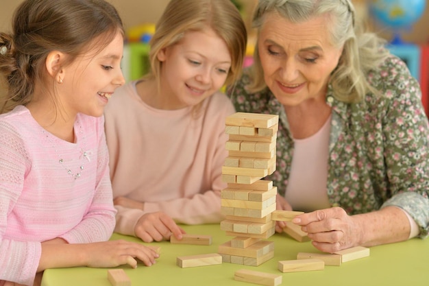 Happy family playing with blocks together