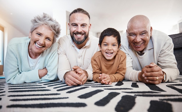 Happy family portrait and living room floor in a home with a smile from bonding together Happiness bonding and love of senior people father and child on a house carpet with grandma and kid