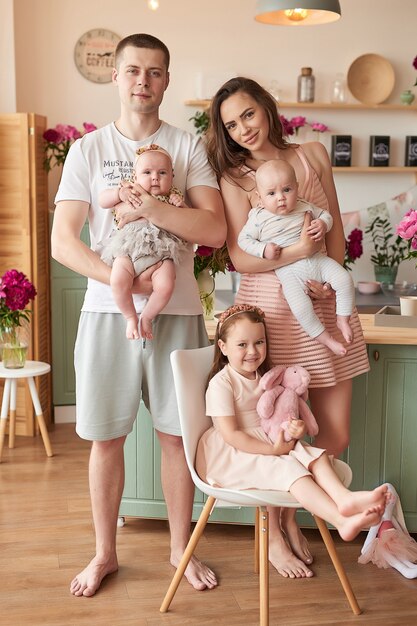 happy family posing in the kitchen