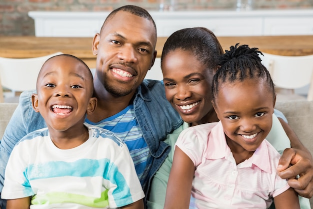 Happy family relaxing on the couch