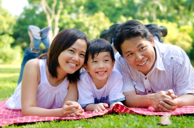 happy family relaxing at park
