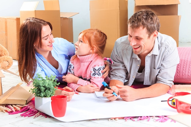 The happy family during repair and relocation