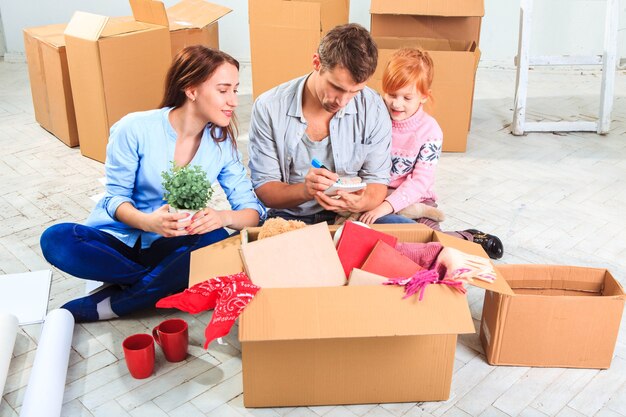 The happy family during repair and relocation