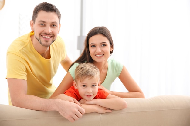 Happy family resting together at home