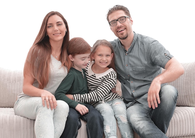 Happy family sitting on the couch in the living room