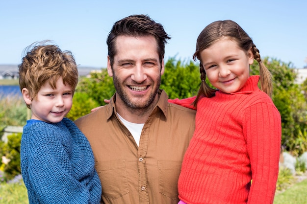 Happy family smiling at camera