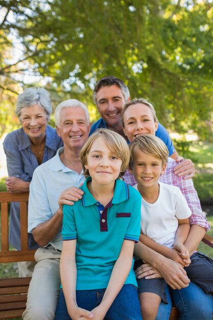 Happy family smiling at the camera 