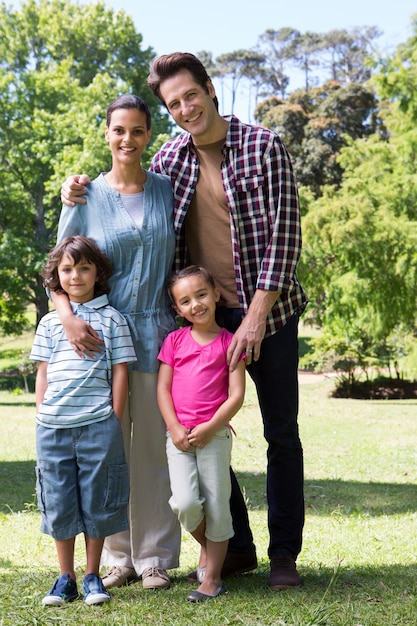 Happy family smiling at camera