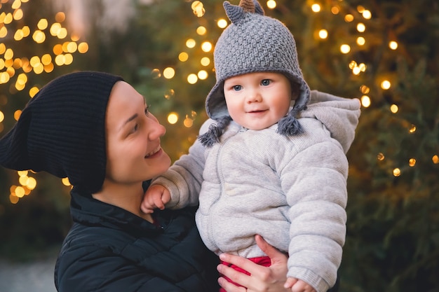 Happy family spend time at a Christmas and New Year holidays in the old town of Salzburg Austria