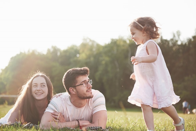 Happy family staying outside