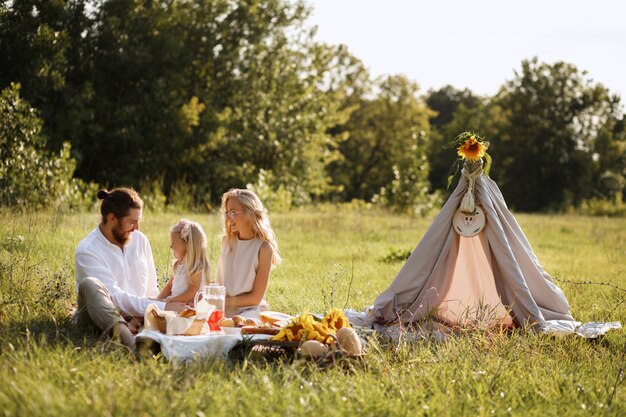 happy family on summer picnic