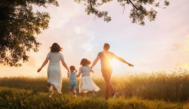 Happy family on summer walk