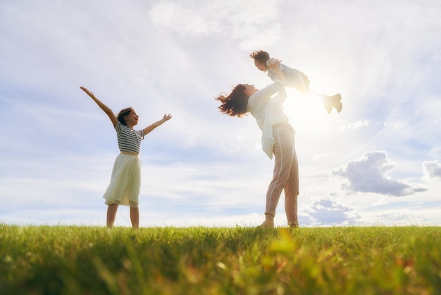 Happy family on summer walk