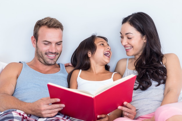 Happy family in their bedroom