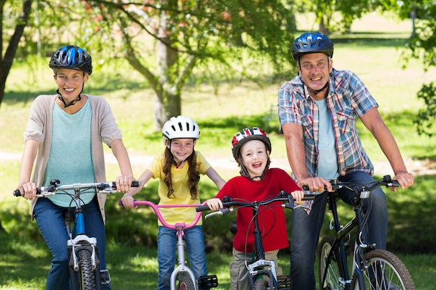 Happy family on their bike at the park 