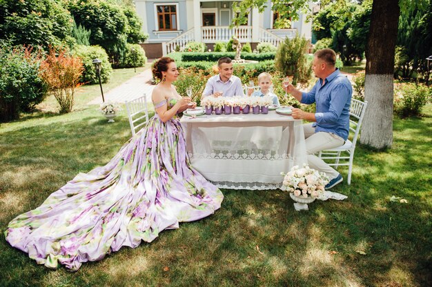 Happy family together in picnic, colorful outdoors