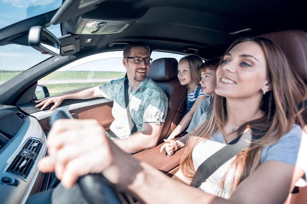 Happy family travels in a comfortable car the concept of freedom and travel