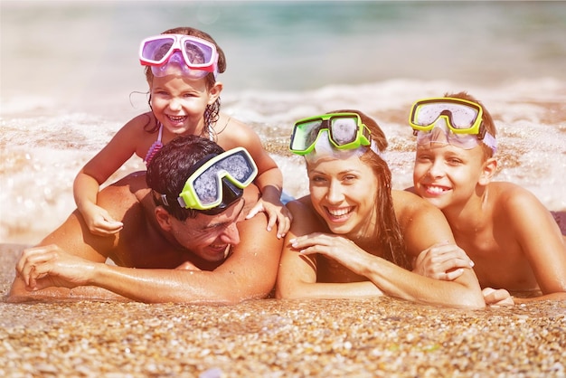 Happy family on vacations on beach