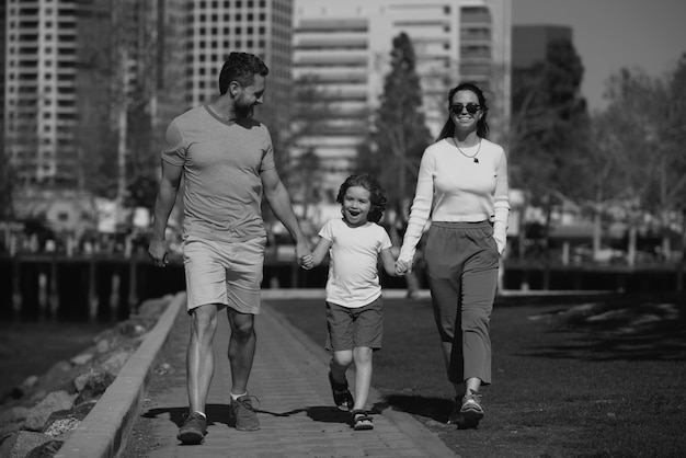 Happy family walking the city street casual lifestyle