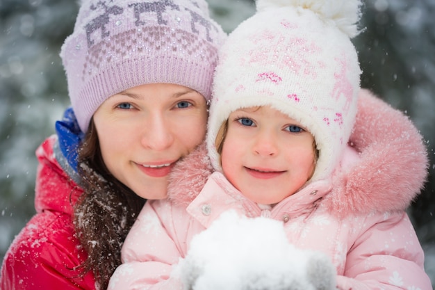 Happy family in winter outdoors