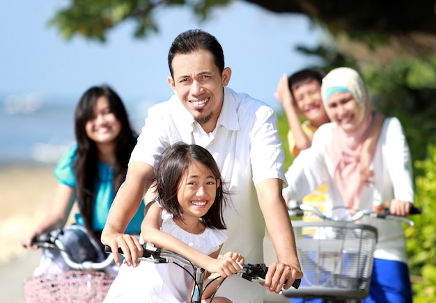 Happy family with bikes