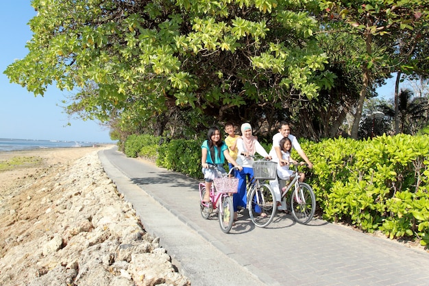 Happy family with bikes