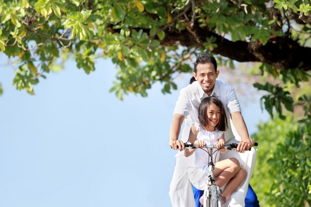 Happy family with bikes