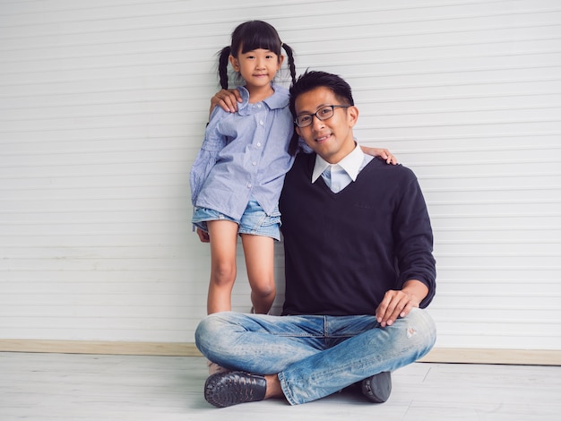 Photo happy family with father  and child playing together