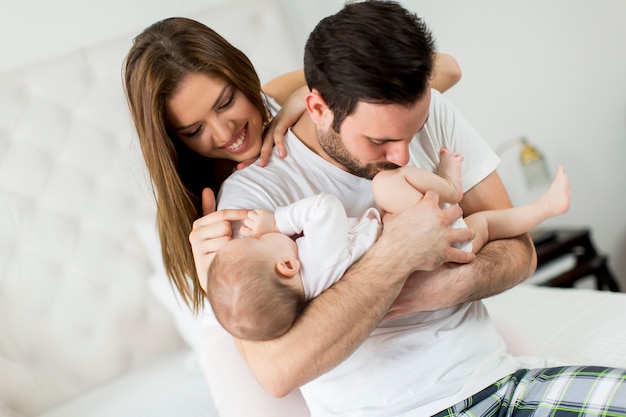 Happy family with newborn baby