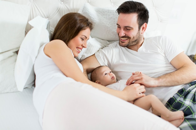 Happy family with newborn baby