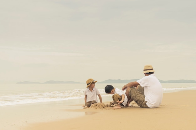 happy family with two kids on the beach,