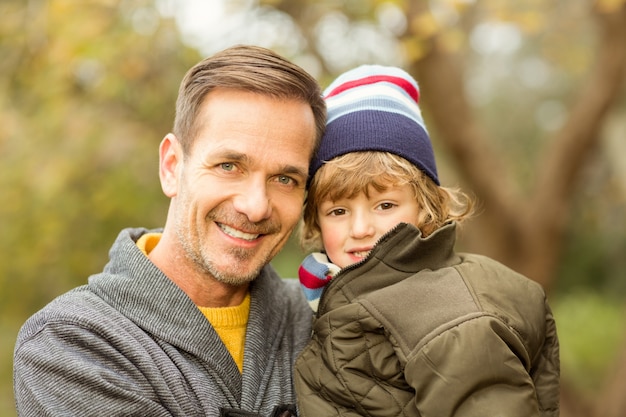 Happy father posing with his son 