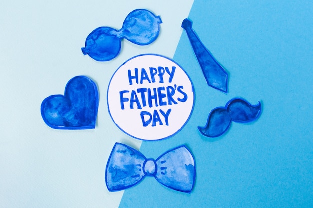 Happy father's day with glasses, tie, heart and more blue drawings on light and dark blue background