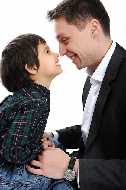 Happy father and son playing with noses