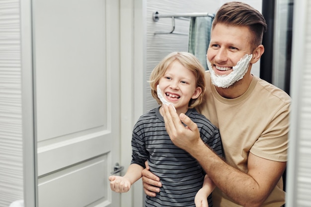 Happy Father and Son Shaving