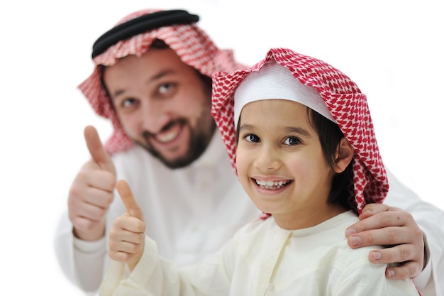 Happy father and son with thumb up