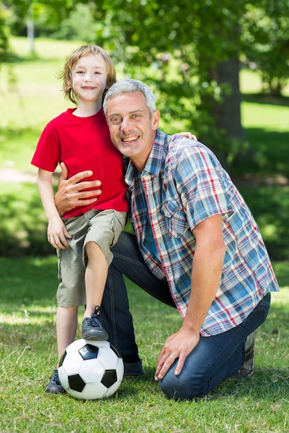 Happy father with his son at the park 