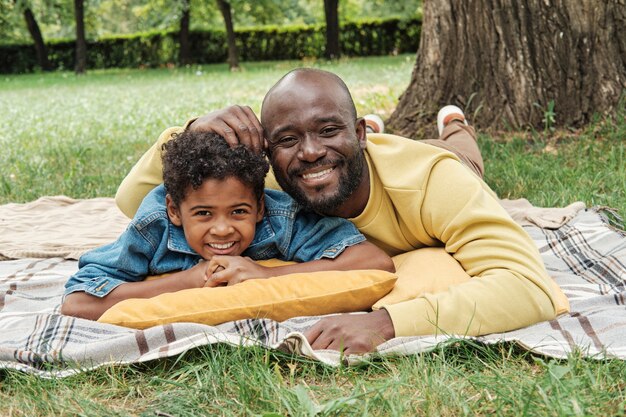 Happy father with son outdoors