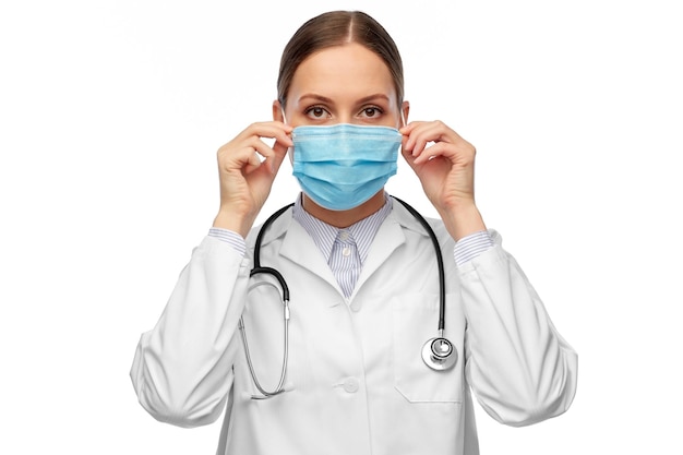 happy female doctor wearing medical mask