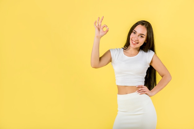 Happy female showing ok sign