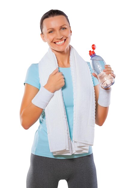 A happy fitness girl smiling isolated