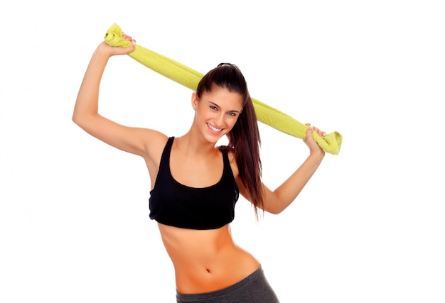 Happy fitness girl with green towel 