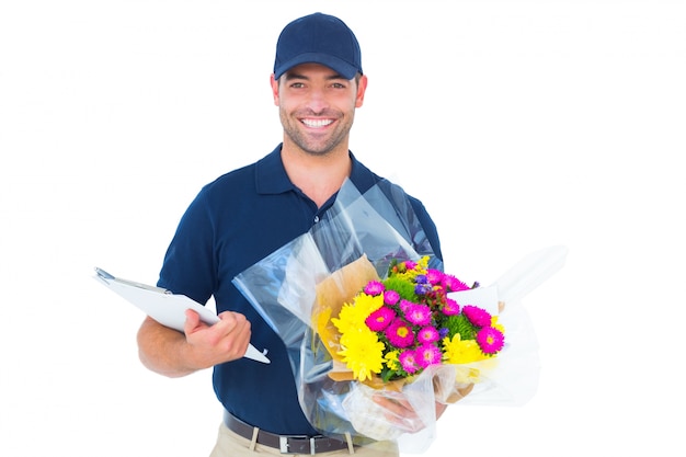 Happy flower delivery man holding clipboard